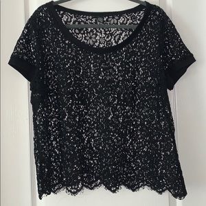 Torrid black lace ringer. Sexy little black top
